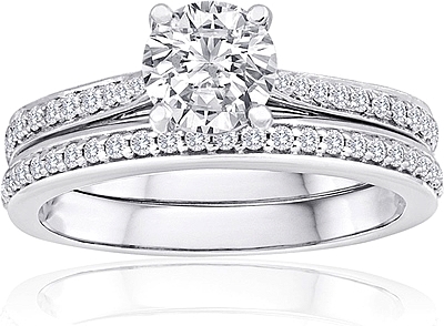 This image shows the setting with a 1.00ct round brilliant cut center diamond. The setting can be ordered to accommodate any shape/size diamond listed in the setting details section below. Wedding band sold separately.