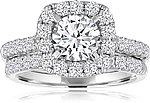 This image shows the setting with a 1.00ct round brilliant cut center diamond. The setting can be ordered to accommodate any shape/size diamond listed in the setting details section below. Wedding band sold separately.