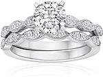 This image shows the setting with a 1.00ct round brilliant cut center diamond. The setting can be ordered to accommodate any shape/size diamond listed in the setting details section below. Wedding band sold separately.