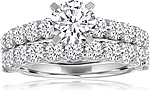 This image shows the setting with a 1.00ct round brilliant cut center diamond. The setting can be ordered to accommodate any shape/size diamond listed in the setting details section below. Wedding band sold separately.