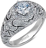 This image shows the setting with a .80ct round brilliant cut diamond. The setting can be ordered to accommodate any shape/size diamond listed in the setting details section below.
