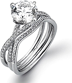 This image shows the setting with a 1.00ct round brilliant cut diamond. The setting can be ordered to accommodate any shape/size diamond listed in the setting details section below. Shown with the matching wedding band; Sold separately.