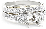 This image shows the setting with a basket made for 1.00ct round brilliant cut diamond. The setting can be ordered to accomodate any size/shape diamond listed on the setting details section below. 