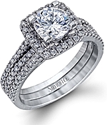 This image shows the setting with a 1ct round brilliant cut diamond. The setting can be ordered to accommodate any shape/size diamond listed in the setting details section below. 
