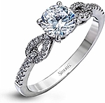 This image shows the setting with a 1ct round brilliant cut diamond. The setting can be ordered to accommodate any shape/size diamond listed in the setting details section below.