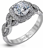 This image shows the setting with a 1ct round brilliant cut diamond. The setting can be ordered to accommodate any shape/size diamond listed in the setting details section below. 