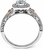 This image shows the setting with a .50ct cushion cut diamond. The setting can be ordered to accommodate any shape/size diamond listed in the setting details section below.