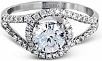 This image shows the setting with a 1.00ct round brilliant cut diamond. The setting can be ordered to accommodate any shape/size diamond listed in the setting details section below. The wedding band shown is sold separately.