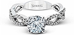 This image shows the setting with a 1ct round brilliant cut diamond. The setting can be ordered to accommodate any shape/size diamond listed in the setting details section below. The wedding band shown is sold separately.