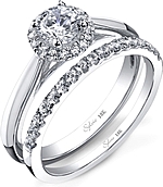 This image shows the setting with a 1.00ct round brilliant cut center diamond. The setting can be ordered to accommodate any shape/size diamond listed in the setting details section below. Shown with the matching wedding band; Sold separately.