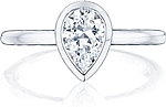 This image shows the setting with a .95ct pear cut center diamond. The setting can be ordered to accommodate any shape/size diamond listed in the setting details section below.