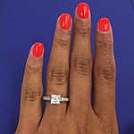 This image shows the ring with a .75ct princess cut center diamond.