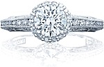 This image shows the ring with a .90ct round brilliant cut center diamond but can be ordered to accommodate any shape or size diamond listed below.
