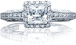 This image shows the ring with a .75ct princess cut center diamond but can be ordered to accommodate any shape or size diamond listed below.