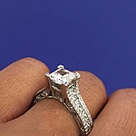 This image shows the setting with a 1.50ct princess cut center diamond.