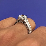 This image shows the setting with a .85ct princess cut center diamond. 