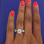 This image shows the setting with a 1.25ct round brilliant cut center diamond. The setting can be ordered to accommodate any shape/size diamond listed in the setting details section below. The diamonds are shown 3/4 around.