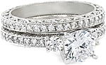 This image shows the setting with a 1.00ct round brilliant cut center diamond. The setting can be ordered to accomodate any shape/size diamond listed in the setting details section below.