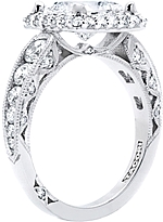 This image shows the setting with a 1.25ct round brilliant cut center diamond. The setting can be ordered to accomodate any shape/size diamond listed in the setting details section below.
