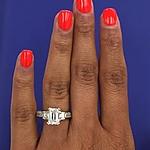 This image shows the setting with a 1.50ct emerald cut center diamond.