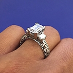 This image shows the setting with a 1.50ct emerald cut center diamond.