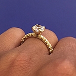 This image shows the setting with a 1.00ct round brilliant cut center diamond. The setting can be ordered to accommodate any shape/size diamond listed in the setting details section below.