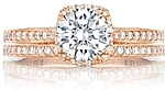 This image shows the setting with a 1.50ct round brilliant cut center diamond. The setting can be ordered to accommodate any shape/size diamond listed in the setting details section below.	 Shown with the matching wedding band; Sold separately.