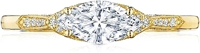 This image shows the setting with a .70ct marquise cut center diamond. The setting can be ordered to accommodate any shape/size diamond listed in the setting details section below.