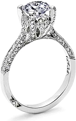 This image shows the setting with a 1.25ct round brilliant cut center diamond. The setting can be ordered to accommodate any shape/size diamond listed in the setting details section below.
