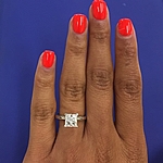 This image shows the setting with a 1.50ct princess cut center diamond.