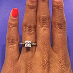 This image shows the small version set with a .75ct princess cut diamond.