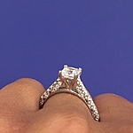 This image shows the setting with a .75ct princess cut center diamond. The setting can be ordered to accommodate any shape/size diamond listed in the setting details section below.