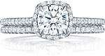 This image shows the setting with a .60ct round brilliant cut center diamond. The setting can be ordered to accommodate any shape/size diamond listed in the setting details section below.