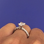 This image shows the setting with a .75ct princess cut center diamond. The setting can be ordered to accommodate any shape/size diamond listed in the setting details section below.