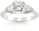 This image shows the setting with a 1.25ct round brilliant cut center diamond. The setting can be ordered to accomodate any shape/size diamond listed in the setting details section below.