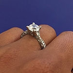 This image shows the setting with a 1.25ct round brilliant cut center diamond. The setting can be ordered to accommodate any shape/size diamond listed in the setting details section below.