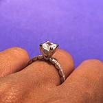 This image shows the setting with a .85ct princess cut center diamond.