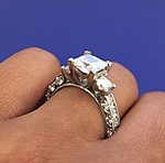 This image shows the setting with a 1.50ct princess cut center diamond.