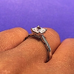 This image shows the setting with a .75ct princess cut center diamond.