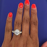 This image shows the ring with a 2.00ct round brilliant cut center diamond but can be ordered to accommodate any shape or size diamond listed below.