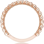 Shown here with pink sapphires 3/4 around
