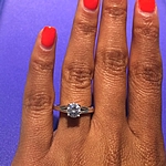 This image shows the setting with a .80ct round cut center diamond. 