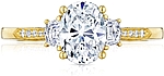 This image shows the setting with a .74ct oval cut center diamond. The setting can be ordered to accommodate any shape/size diamond listed in the setting details section below.