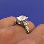 This image shows the setting with a 2.00ct emerald cut center diamond.