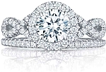 This image shows the setting with a 1.00ct round brilliant cut center diamond. The setting can be ordered to accommodate any shape/size diamond listed in the setting details section below. Shown with the matching wedding band; Sold separately.