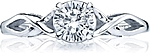 This image shows the setting with a .60ct round cut center diamond. The setting can be ordered to accommodate any shape/size diamond listed in the setting details section below.