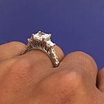 This image shows the setting with a 1.50ct princess cut center diamond.