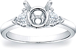 This image shows the setting with a basket made to hold a 1.00ct round brilliant cut center diamond. The setting can be ordered to accommodate any shape/size diamond listed in the setting details section below.