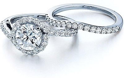 This image shows the setting with a 1.25ct round brilliant cut center diamond. The setting can be ordered to accommodate any shape/size diamond listed in the setting details section below. The matching wedding band is sold separately. 
