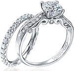 This image shows the setting with a 1.25ct round brilliant cut center diamond. The setting can be ordered to accommodate any shape/size diamond listed in the setting details section below. The matching wedding band is sold separately. 